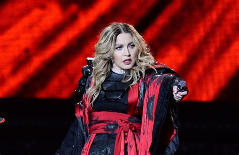madonna exposed a fan s breasts on stage in front of thousands of people at a gig in brisbane