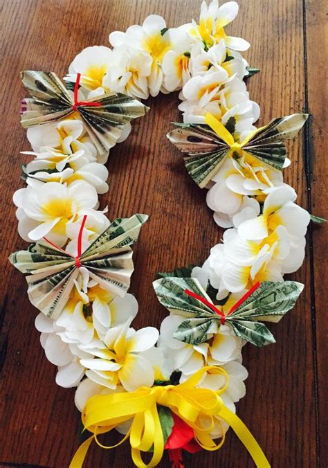 She cut out blocks from some of the shirts my dad wore when he was a boy. Money Lei made with eighty dollars by AlohaMoneyLeis on ...