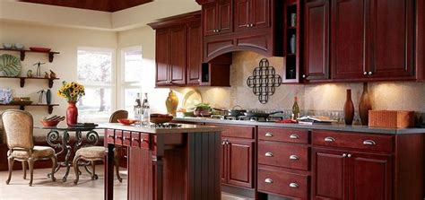 Wood kitchen pantry cabinet, 36 in. Are those cherry cabinets with brushed nickel hardware? Be ...