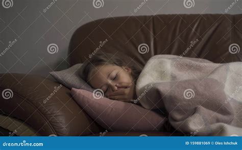 Sick Caucasian Girl Coughing While Lying Under Blanket At Home The