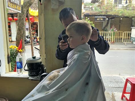 This includes listening to them. The boys get a haircut in Vietnam | Our overseas adventures