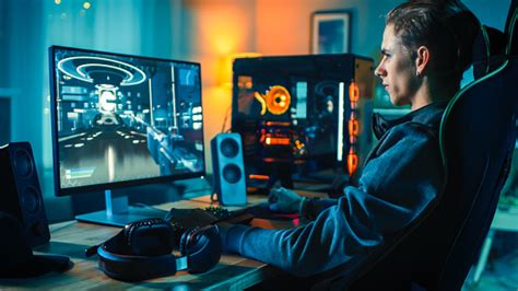 Cheerful Gamer Playing Firstperson Shooter Online Video Game On His
