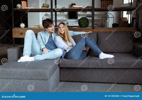 Happy Young Beautiful Couple Enjoying Time Together At Home Stock Image