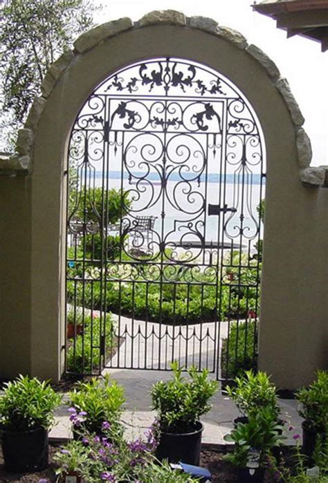 Customize your arizona home with beauty, security and durability that a new first impression ironworks iron and wood gate will provide you. Driveway & Wrought Iron Gates - Sylvan's Custom Ironworks