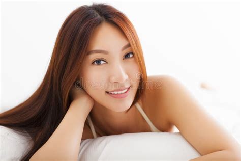 beautiful asian woman relaxing on the bed stock image image of female beautiful 47259073