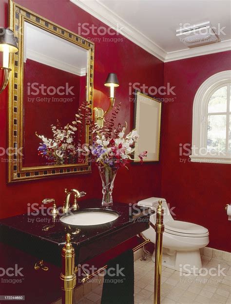 Red Powder Room With Elegant Vanity Stock Photo Download Image Now