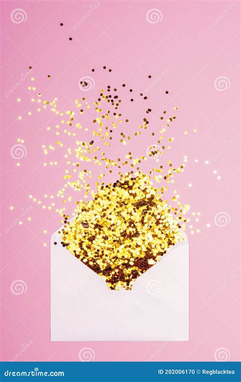 Golden Confetti Scattered From Envelope On Pink Background Stock
