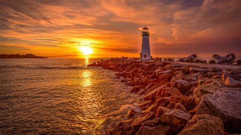 2048x1152 Lighthouse Sunrise And Sunset 4k 2048x1152 Resolution Hd 4k