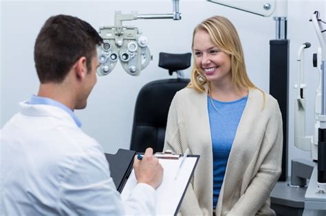 premium photo optometrist consulting female patient