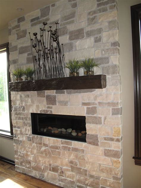 Bathyscafocus by focus fires | open faced modern wood fireplace. Linear fireplace unit with natural stone surround and ...
