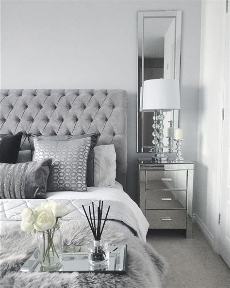Collection by lulu & georgia. Grey bedroom inspo. Grey interior bedroom. Silver mirror ...