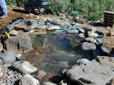 Building a pond takes time and detailed planning. How to Create a Pond and Stream for an Outdoor Waterfall ...
