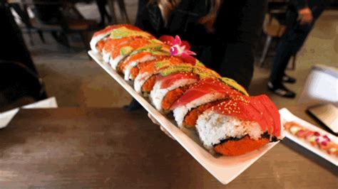 Prepackage sushi, sashimi rolls, and other fresh selections with this emperor's select 5 1/4 x 8 1/2 extra large sushi container with lid. There's A Giant Sushi Roll In San Diego So Obviously We Tried It