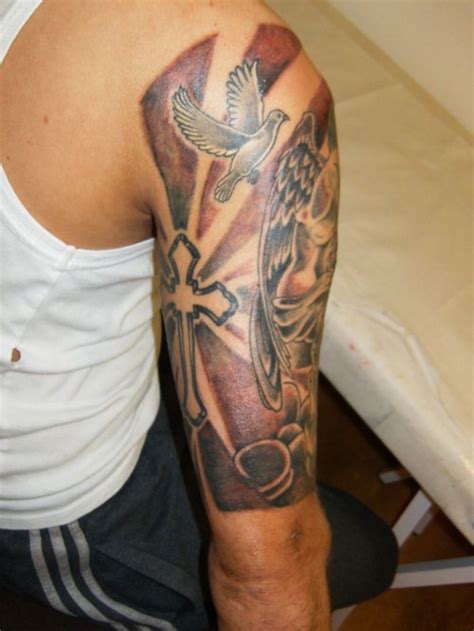 Chest & arm sleeve tattoo. 50 Arresting Religious Tattoo Sleeves