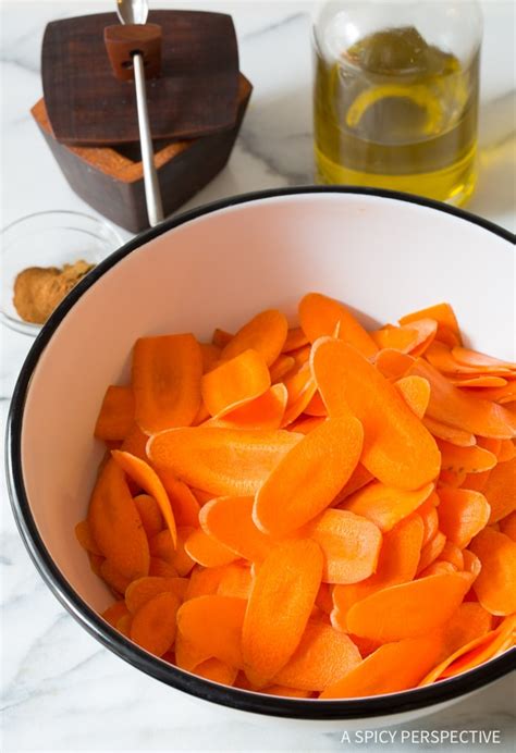 I like to keep a little bag of them at my desk to stave off any afternoon cravings that might come up! Healthy Baked Carrot Chips - A Spicy Perspective