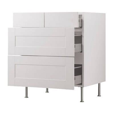 Also the frame proportions feel too wide. Seeking timeless white cabinets