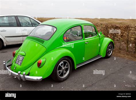 A Bright Green Restored Vw Beetle Stock Photo Alamy
