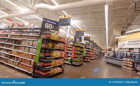 People Shopping In Walmart And Back Aisle Of The Store Editorial Photo