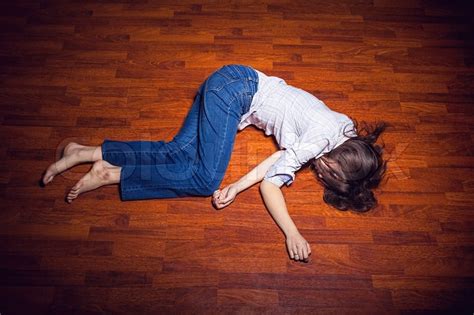 Girl Lying On The Floor In An Empty Stock Image Colourbox