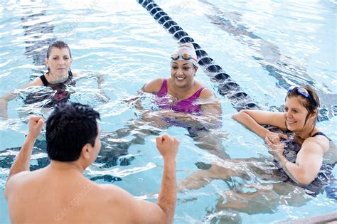People Relaxing In Swimming Pool Stock Image F0054870 Science