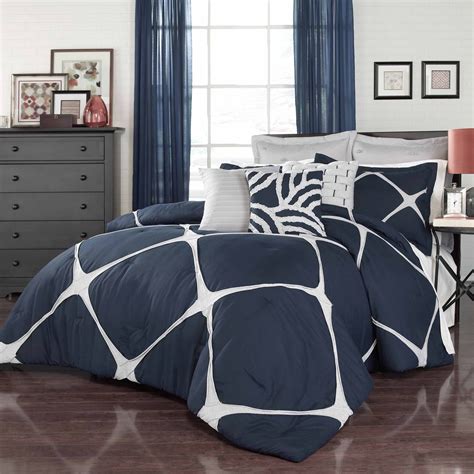 Choosing bedding sets in this color combination may be the way to go. Cersei Navy Comforter Set - Queen - BeddingSuperStore.com
