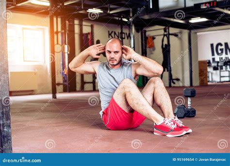 Man Doing Sit Ups Stock Photo Image Of Indoors Athlete 95169654