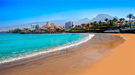 Tenerife beaches are all around its island, as close to paradise as they may get. Piramides Resort surrounding, Las Americas Beach, Tenerife ...