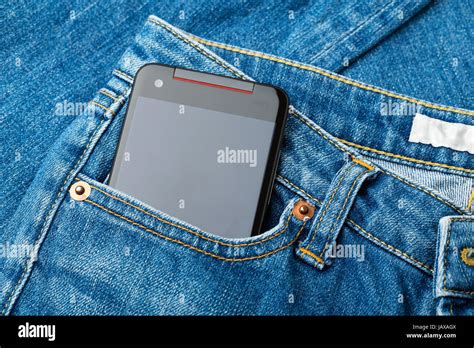 Blue Jean Pocket With Mobile Stock Photo Alamy