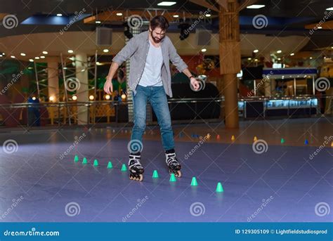 Man In Roller Skates Skating On Roller Rink Stock Image Image Of