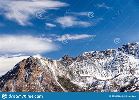 Snow Capped Mountain Peak Glacier Against Blue Sky Stock Photo Image