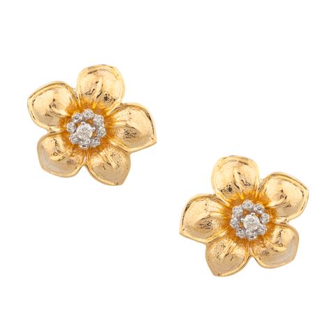 Diamond Flower Stud Earrings In 14kt Gold