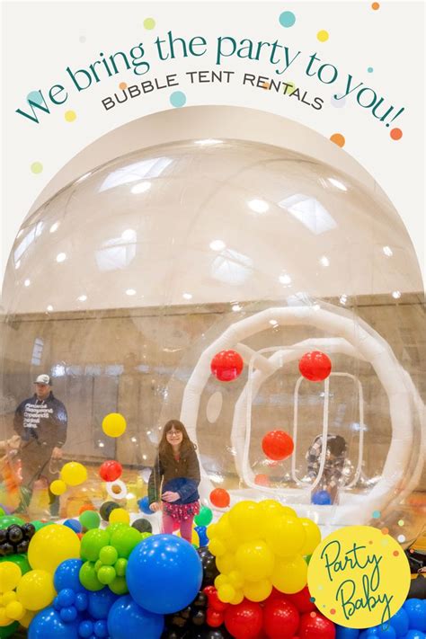 There Is A Bubble Tent With Balloons In It