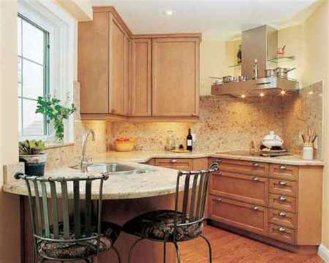Though small and difficult for many to reach, these cabinets can store special china or items such as serving platters. Home Design: Small Kitchen for Small Space Design and ...