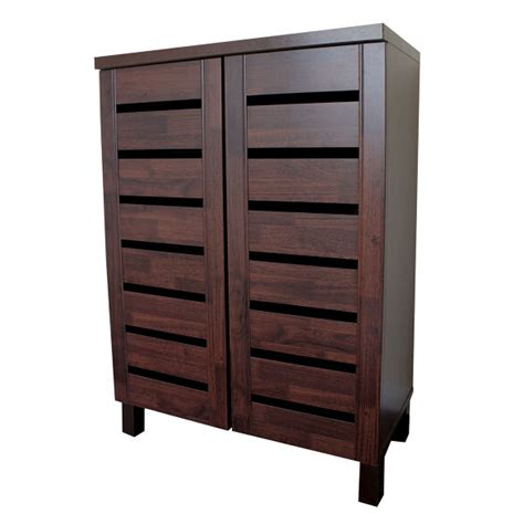 The shoe cabinet is complemented by two of its slatted doors for a sleek appearance. Slatted Shoe Storage Cabinet - Mahogany Effect | STORE