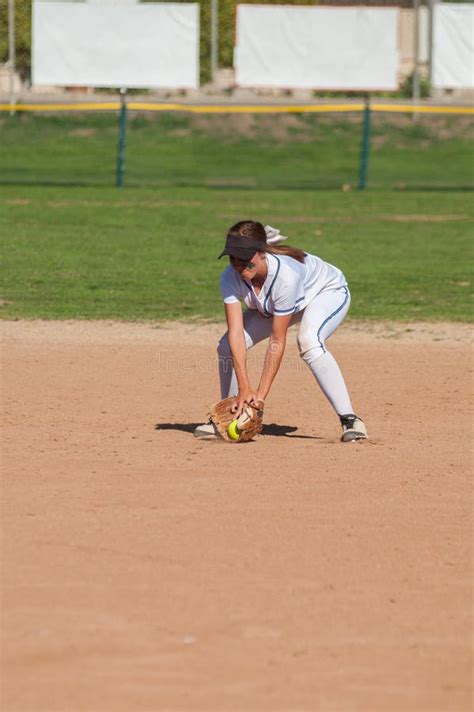 Softball Player Fielding A Ground Ball Stock Photo Image Of Athletic