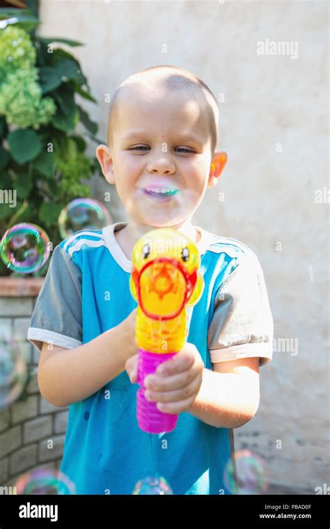 Boy Doing Soap Bubbles Stock Photo Alamy