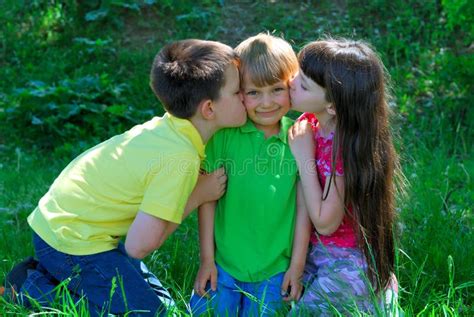 Happy Kissing Children Stock Photo Image Of Childhood 2486902