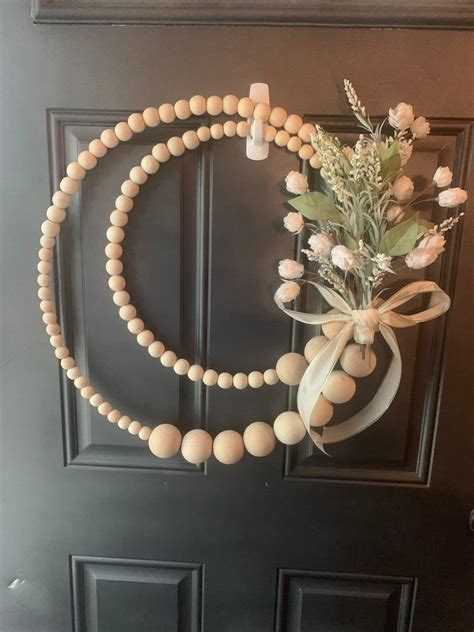 Wooden Bead Wreath In 2021 Wooden Wreaths Wood Beads Diy Diy Floral