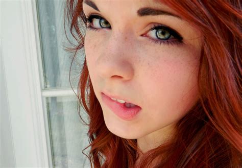 redhead women green eyes face freckles biting lip wallpapers hd desktop and mobile