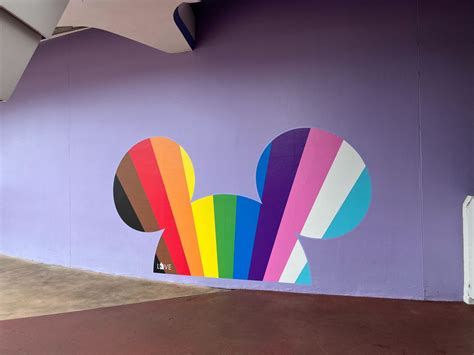 Purple Wall Decorated With Progressive Pride Flag Mickey At Magic