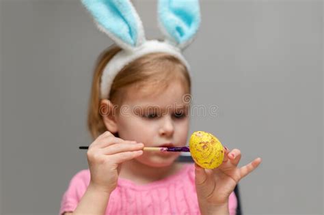 Little Girl In Easter Bunny Ears Painting Easter Egg Holiday Crafts