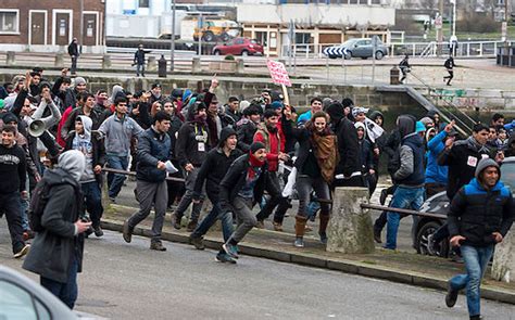 Migrants Storm Calais Ferry Power Line