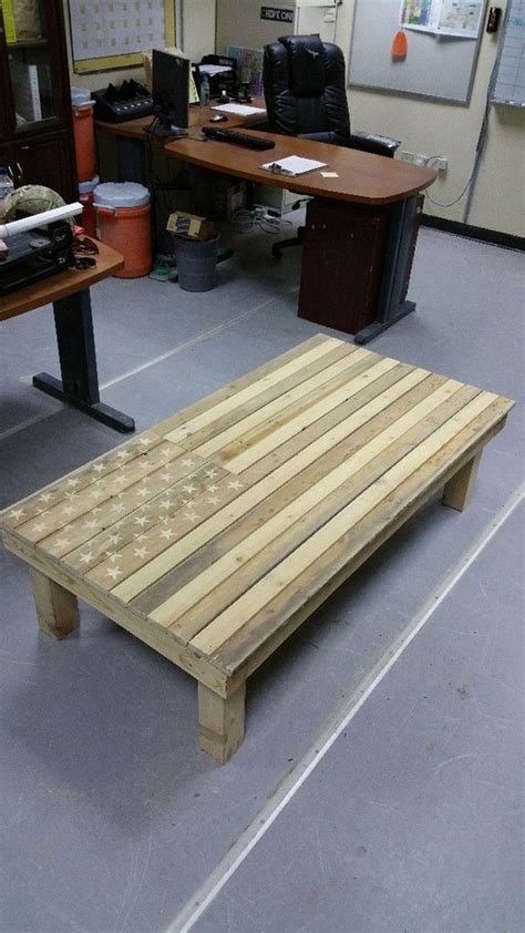 This guide suggests you use liquid nails to assemble all the pallets firmly. American flag pallet coffee table | Wooden pallet coffee ...