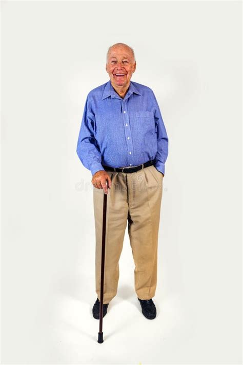 Happy Elderly Man Standing With His Stock Photo Image Of Chair