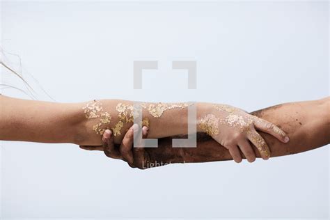 Man And Woman Grasping Each Others Arms — Photo — Lightstock