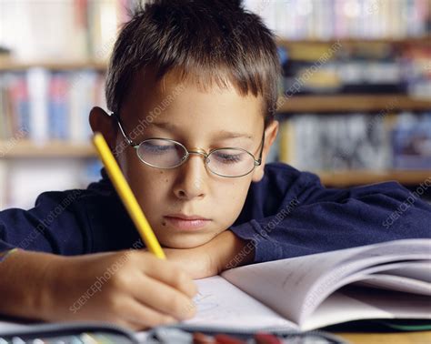 Child Doing Homework Stock Image H4600329 Science Photo Library