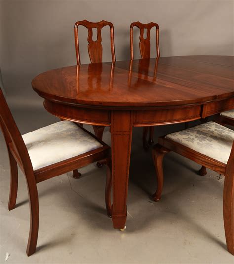 Its compact and functional design makes it a great home bar table or casual dining table. Mahogany Extending Dining Table and Six Dining Chairs ...