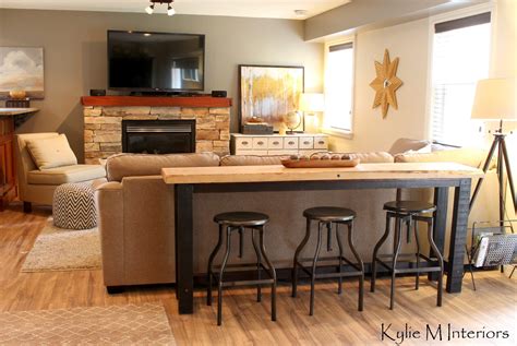 5% coupon applied at checkout. live edge bar table and stool behind a sectional for guy man friendly decorating in a family ...