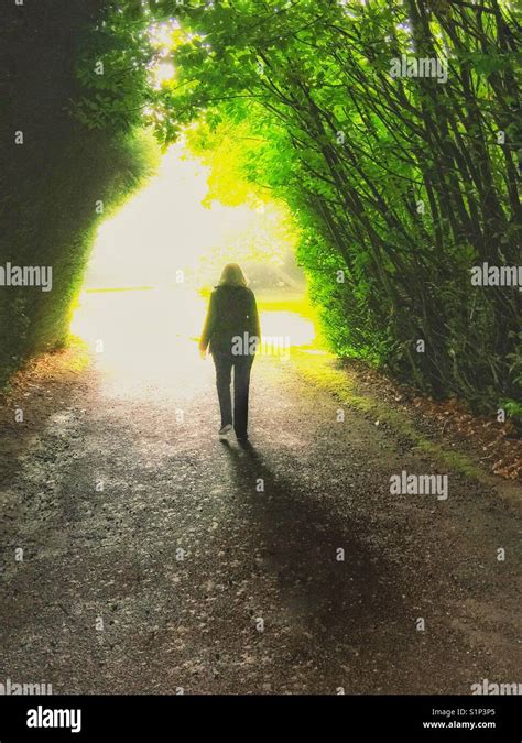 A Walk Into The Light Stock Photo Alamy