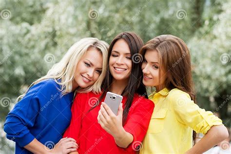 Group Of Gorgeous Girls Taking Selfies In The Park Stock Image Image Of Camera Modern 69299909